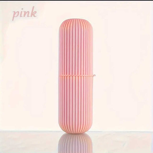 Portable Toothbrush Holder & Travel Case in pink color, designed for travel and keeping oral care essentials organized.